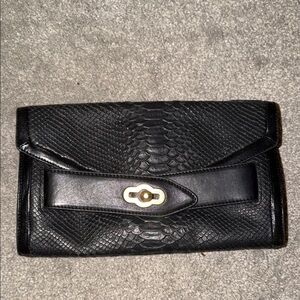 Pour la Victoire Black Textured Leather Clutch Wallet